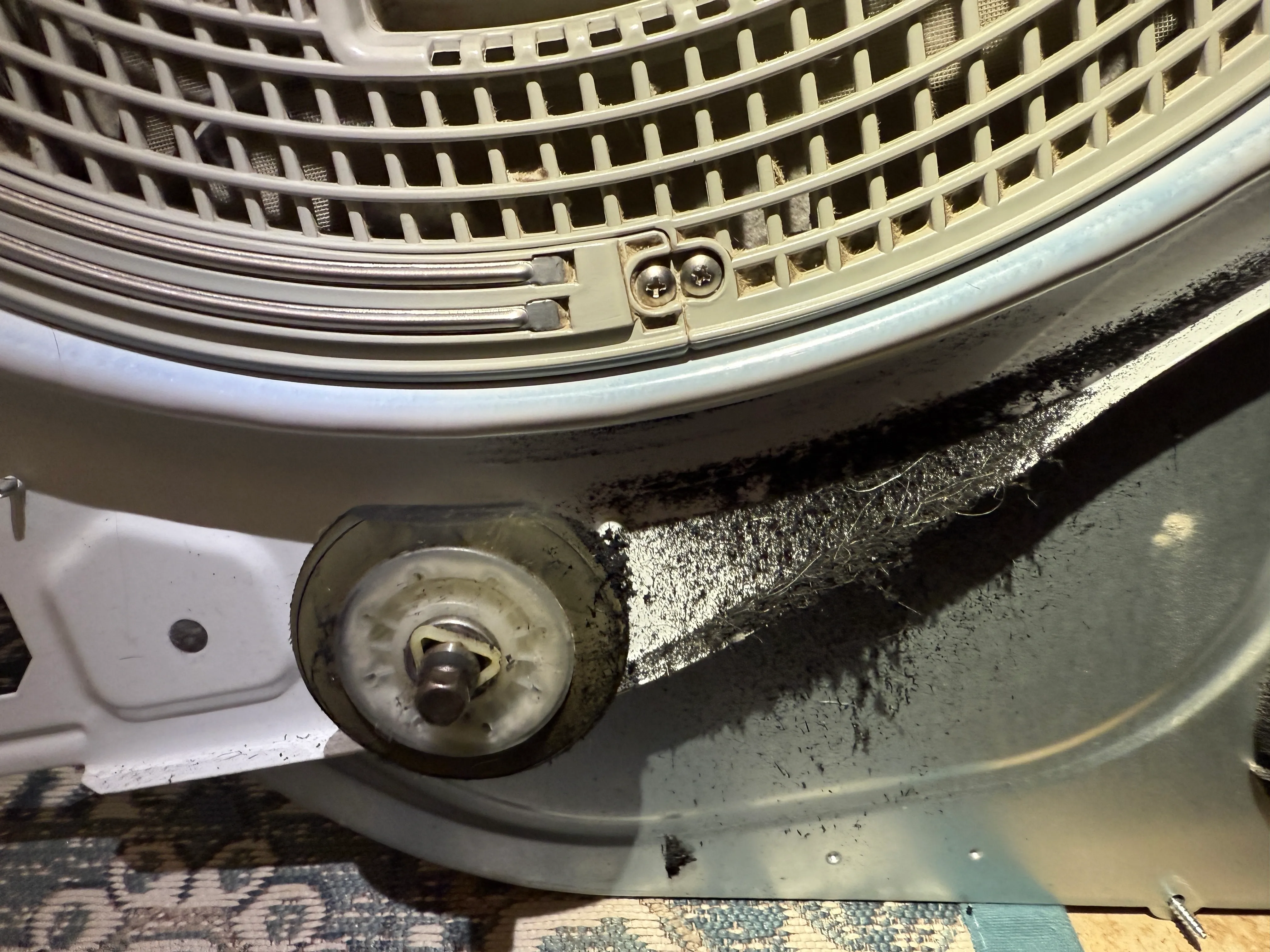 LG Dryer - Broken drum support wheel