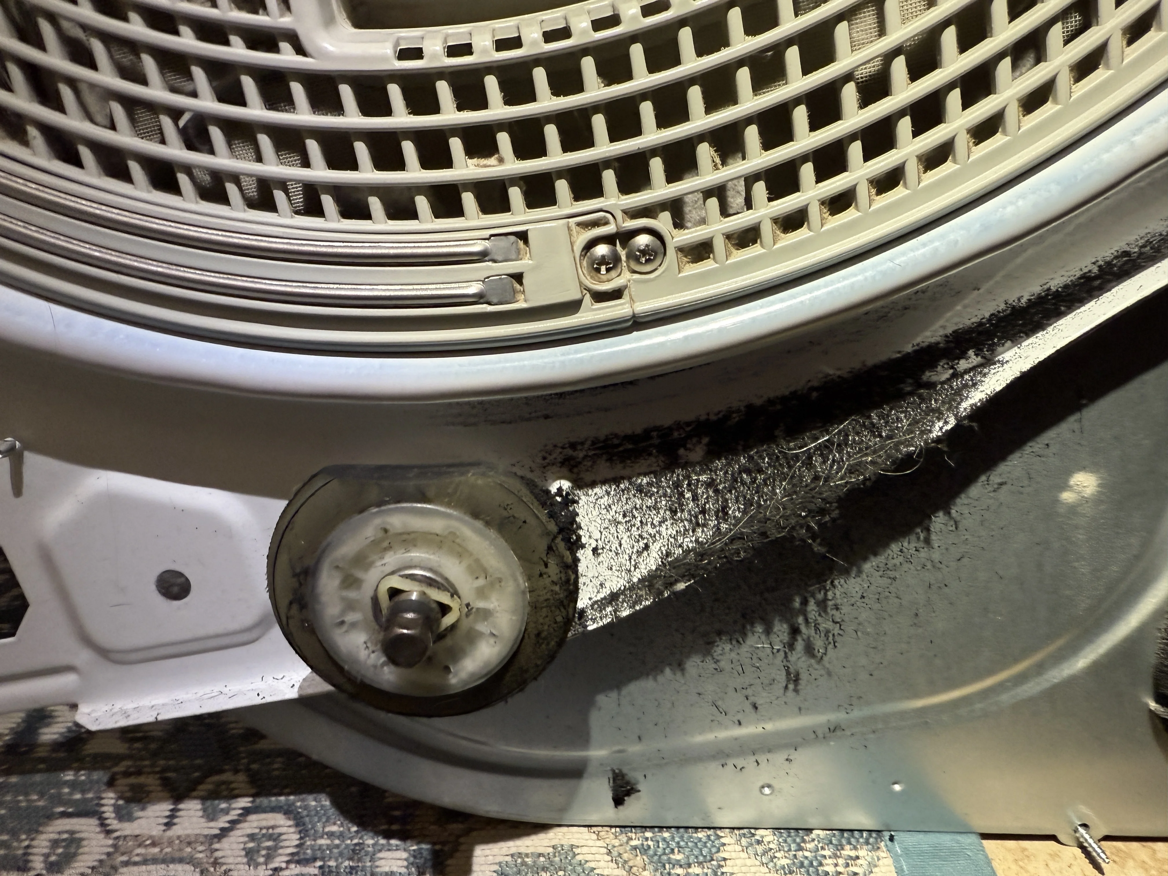 LG Dryer - Broken drum support wheel