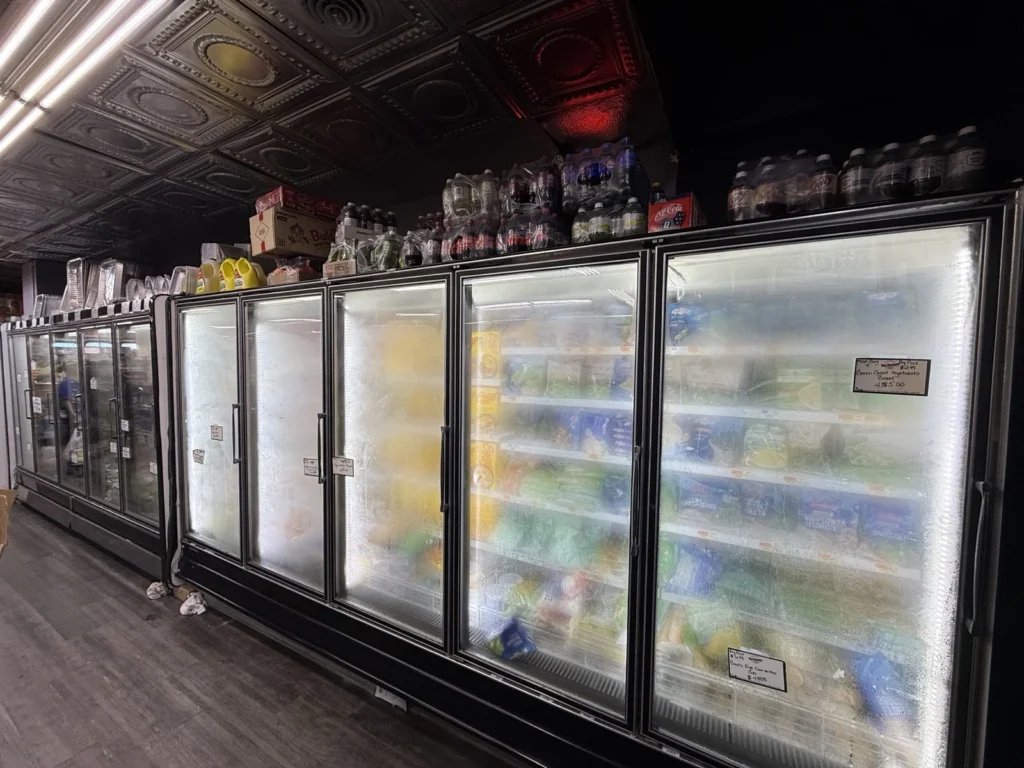 Glass-door freezer merchandiser