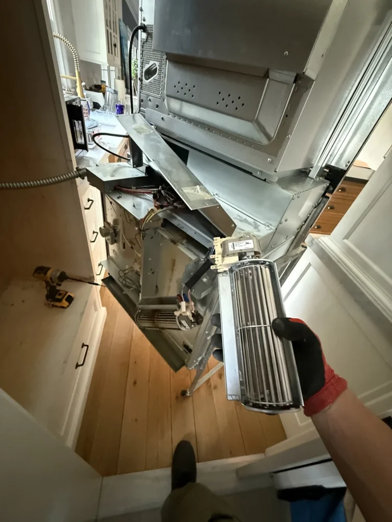 Wall oven cooling fan: Blower removed from a combo unit